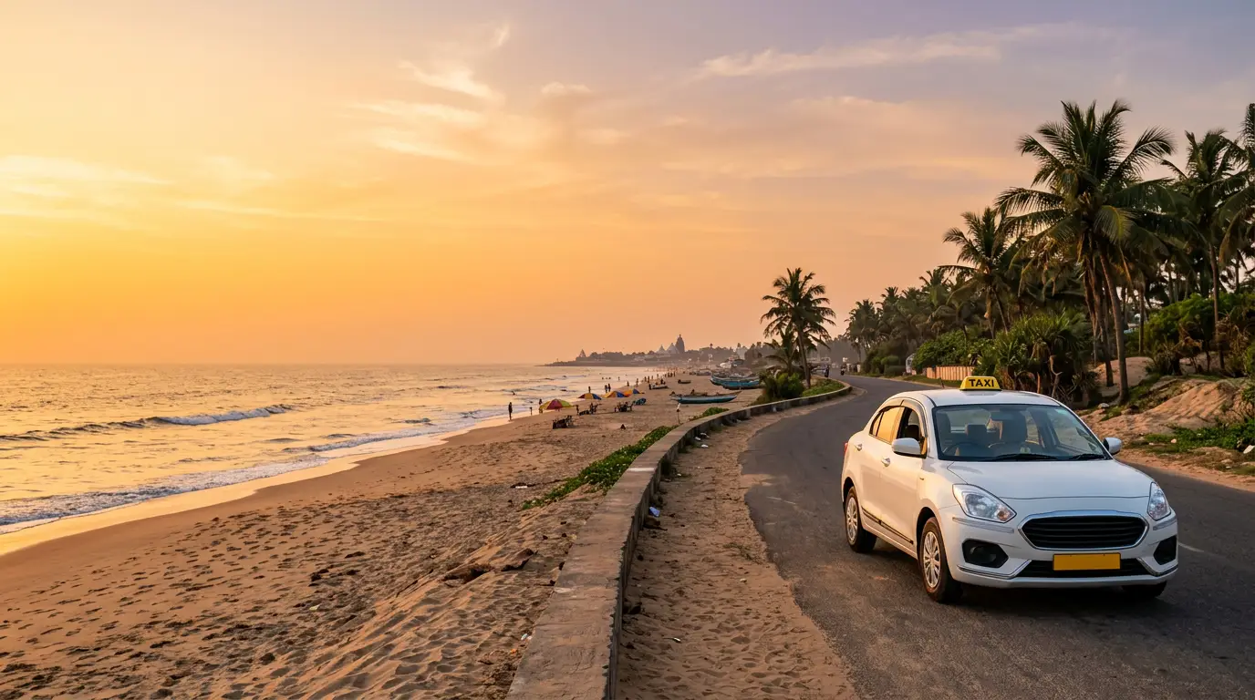 White Puri Taxi Service cab on the coastal road beside Puri beach at sunset